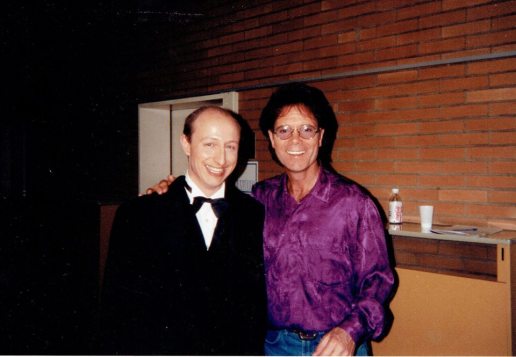 With Cliff Richard, backstage in Bochum, Germany. My bare bottom made its debut television appearance.