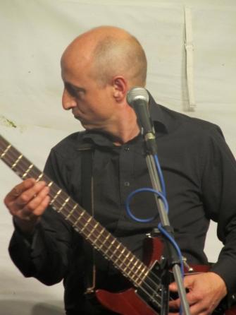 Performing on bass and lead vocal with Dr. Joe Joe at Woodfest, Hertfordshire